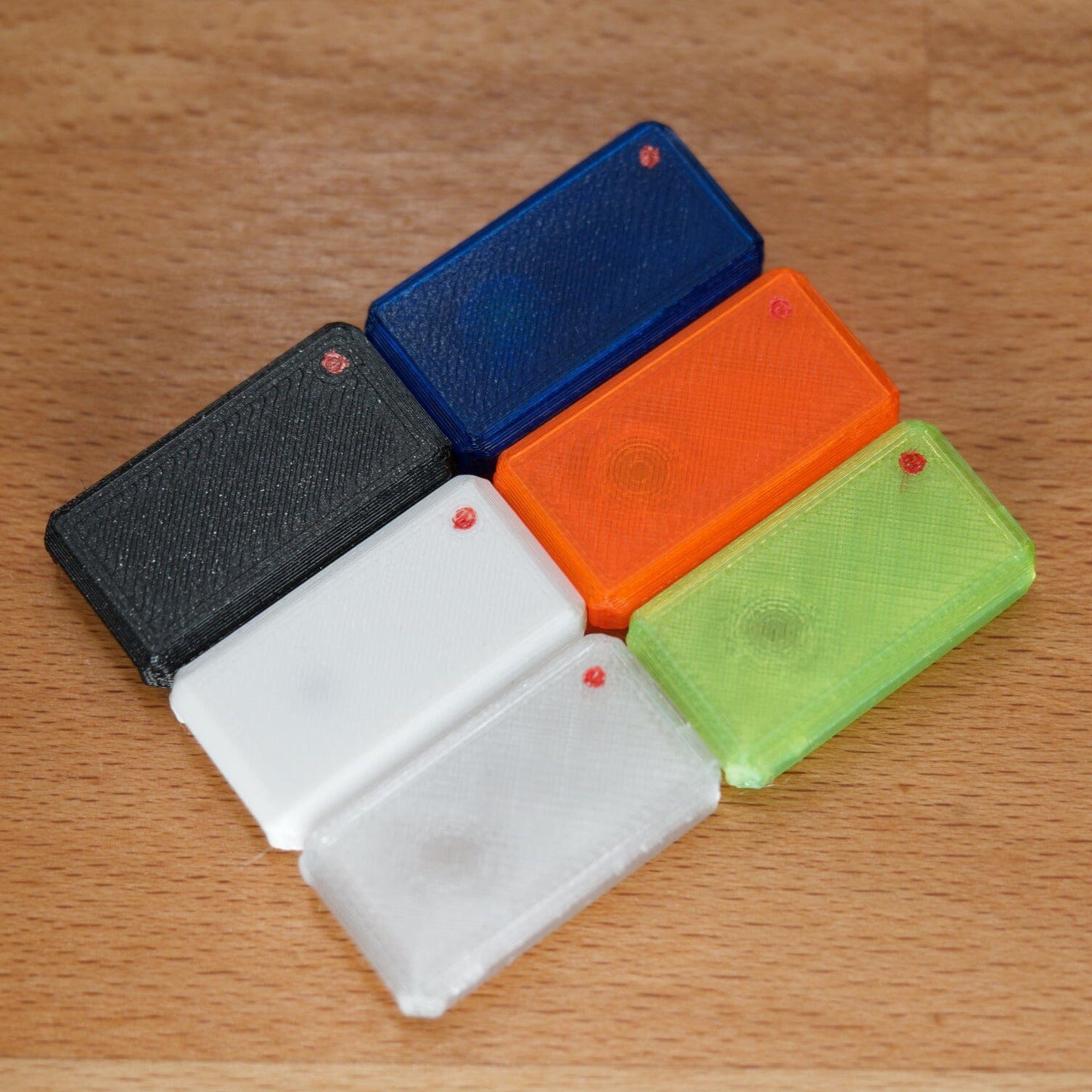 USB Nova cases in 6 different colors. Blue, black, white, orange, transparent, green.